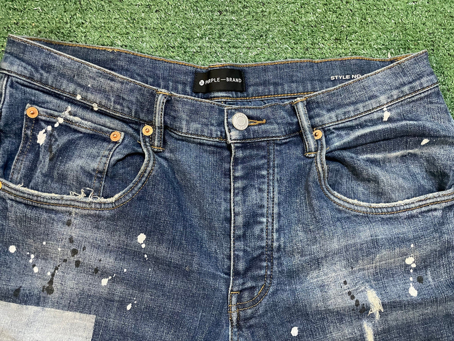 Purple Brand paint splatter jeans