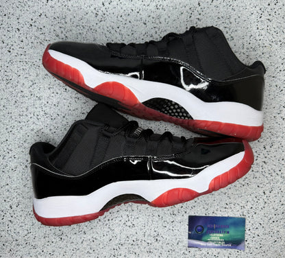 Jordan 11 Low Bred 10.5 Men/12 Women “Preowned”