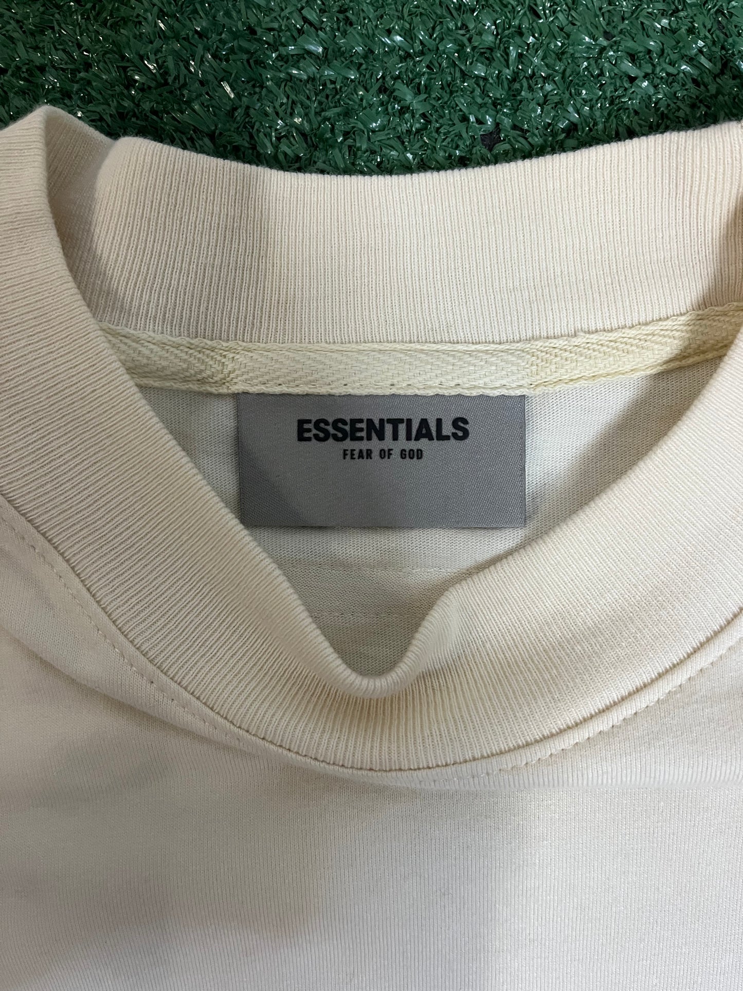 Fear of God Essentials long sleeve buttercream tee