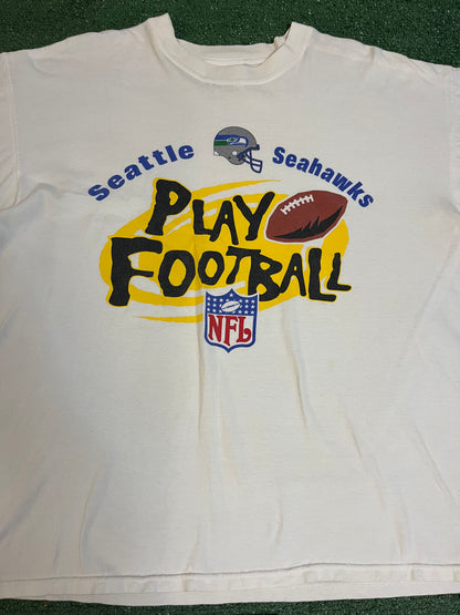 Vintage 1990s Seattle Seahawks play football tee