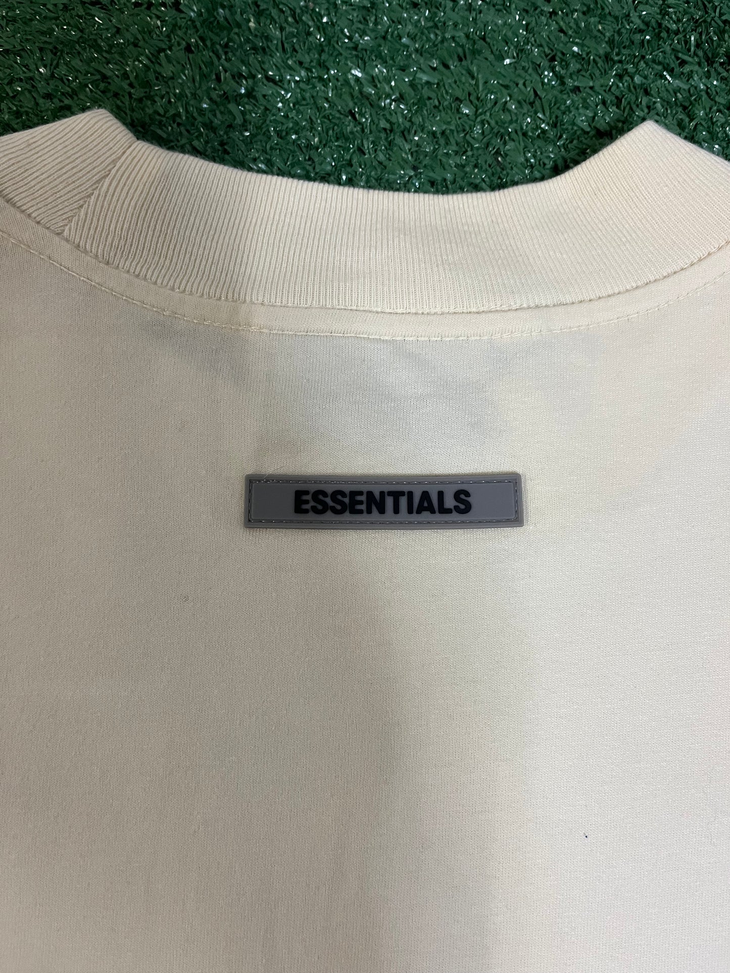 Fear of God Essentials long sleeve buttercream tee