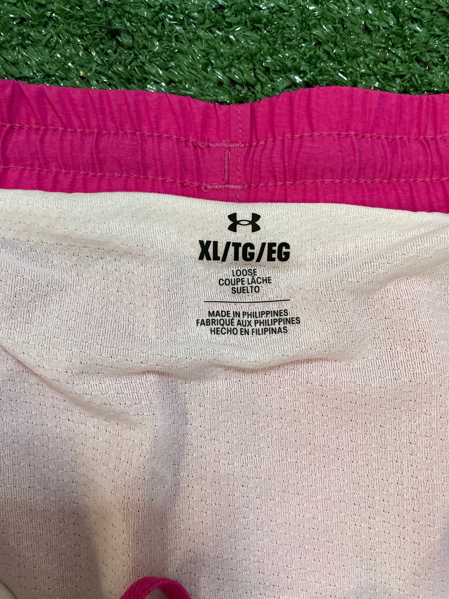 Under armour fly by pink shorts