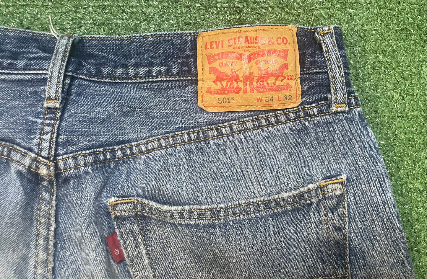 Levi’s 501 distressed jeans
