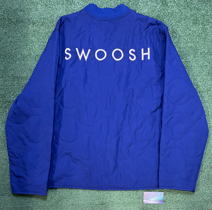 Nike swoosh quilted blue jacket