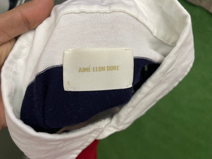 Aimé Leon Dore Blue Striped Polo Shirt
