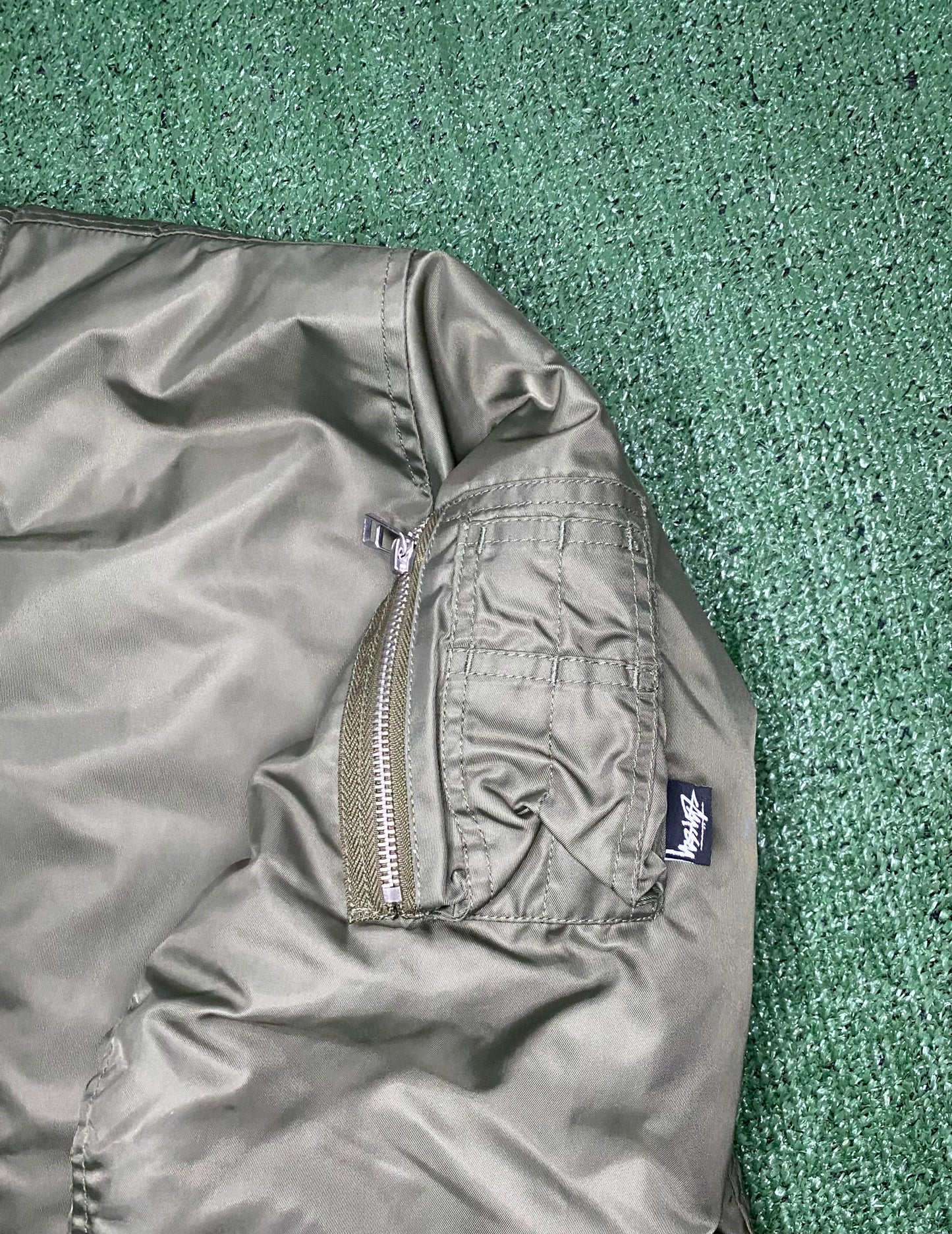 Stussy 40th anniversary x comme des Garçons MA-1 jacket olive