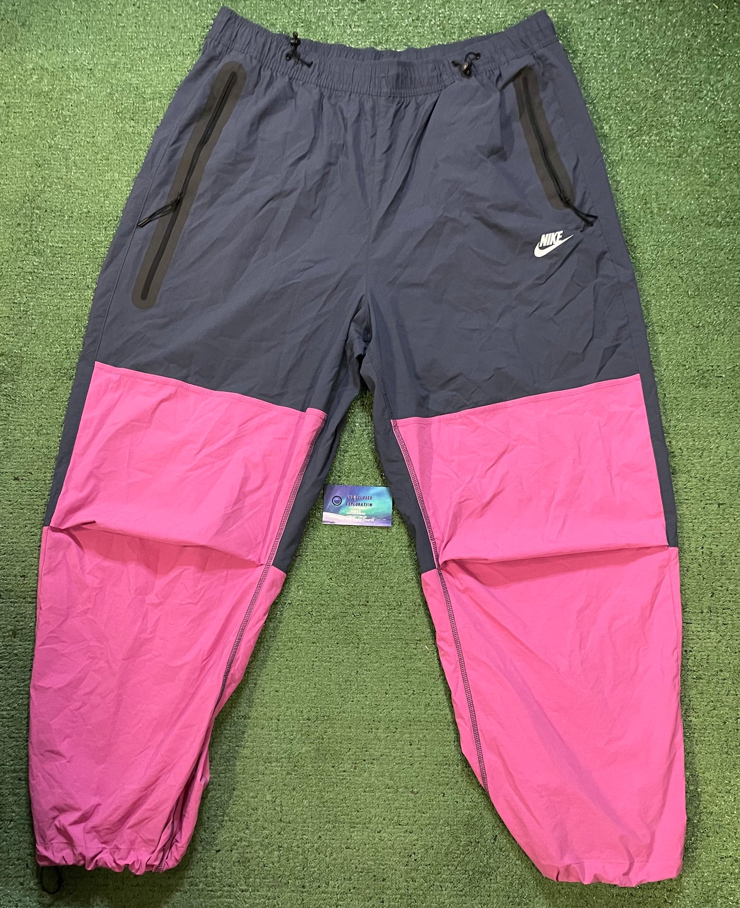 Nike tech woven pants blue and pink pants
