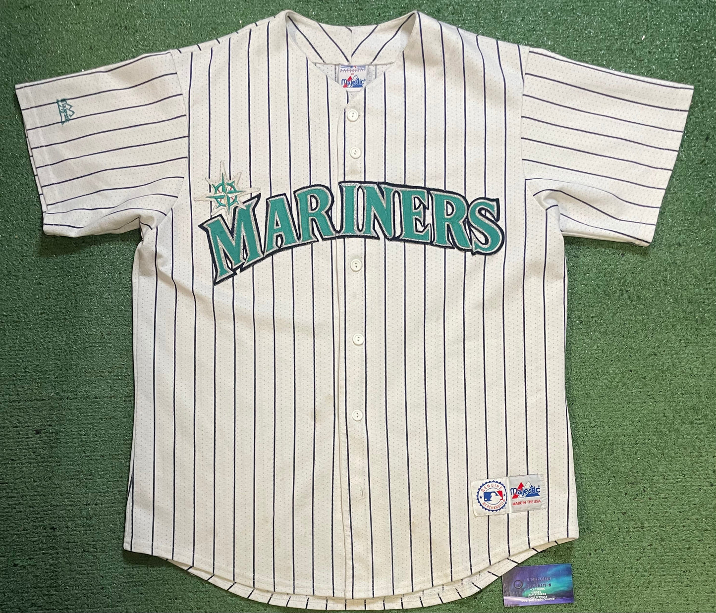 Vintage 1990s Seattle Mariners pinstripe white and teal jersey