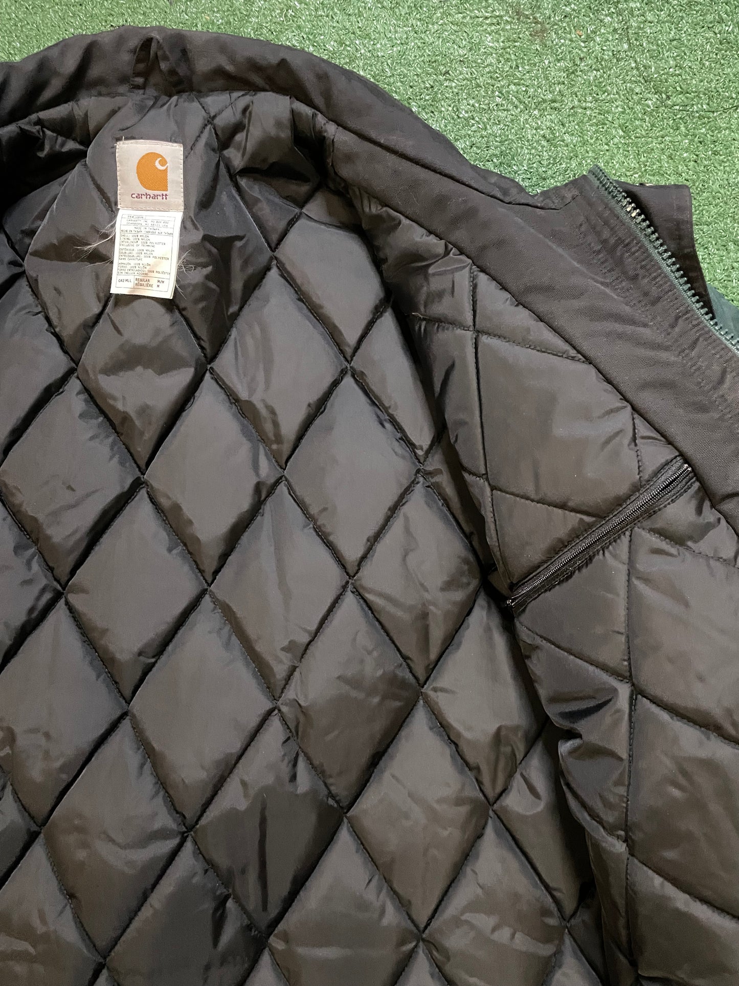 Vintage Carhartt forest green utility jacket