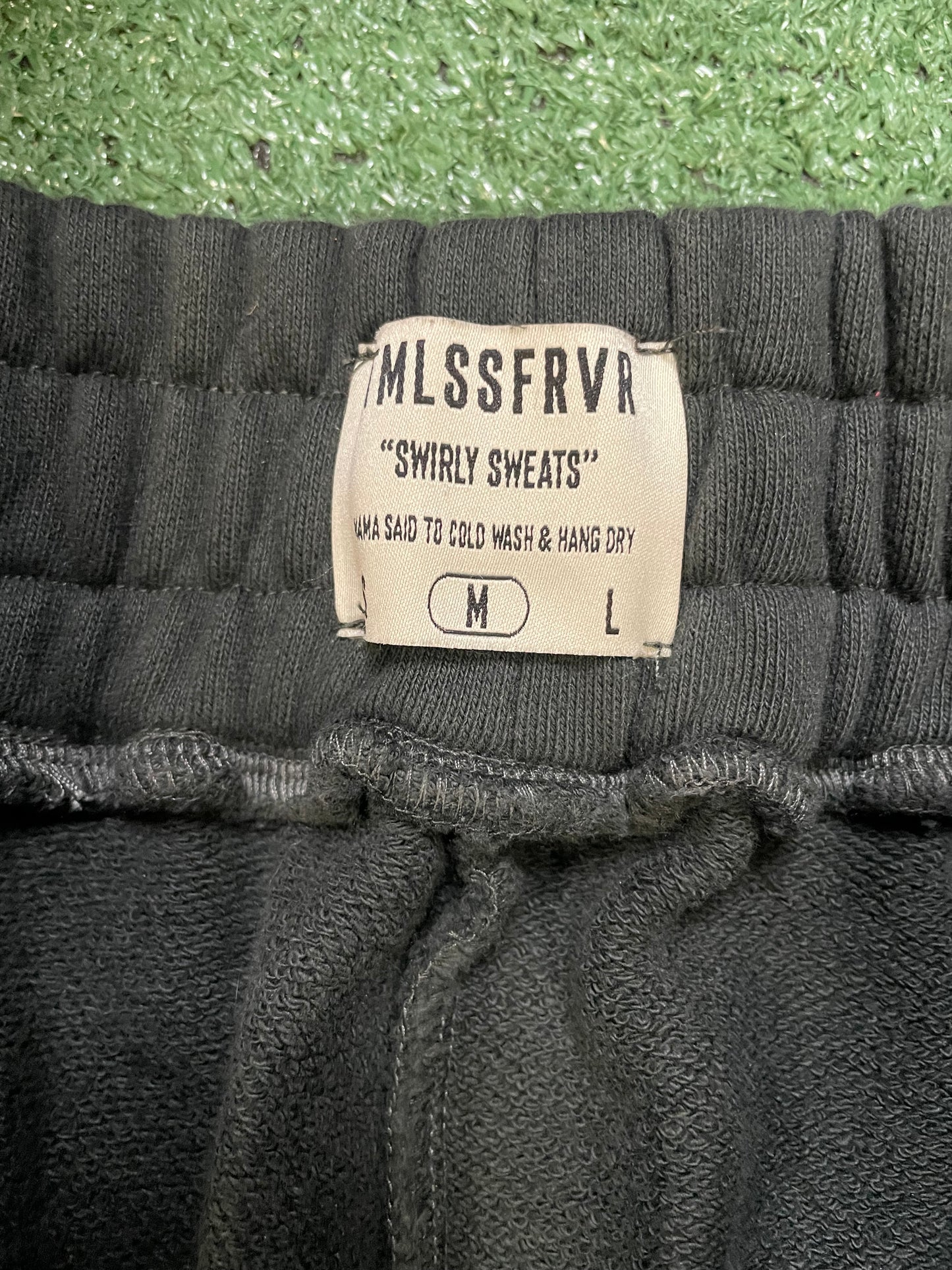 TMLSSFRVR black swirly sweatpants