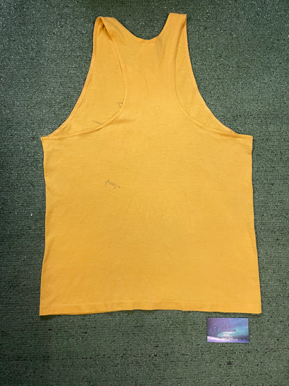 Vintage 1980s Nike repeat swoosh yellow tank top