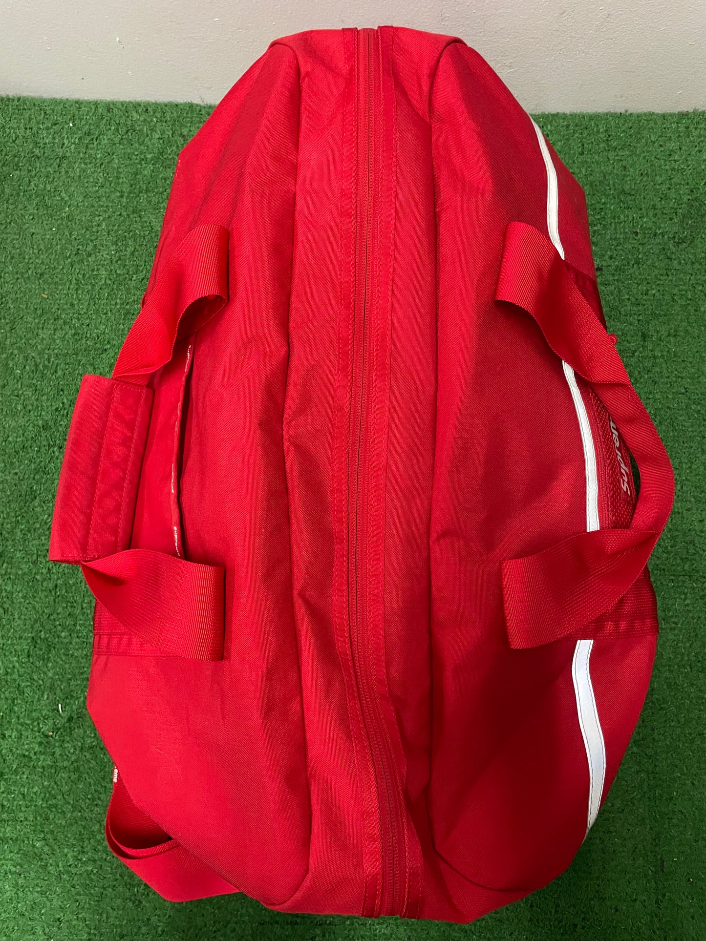 Supreme red duffle bag FW24