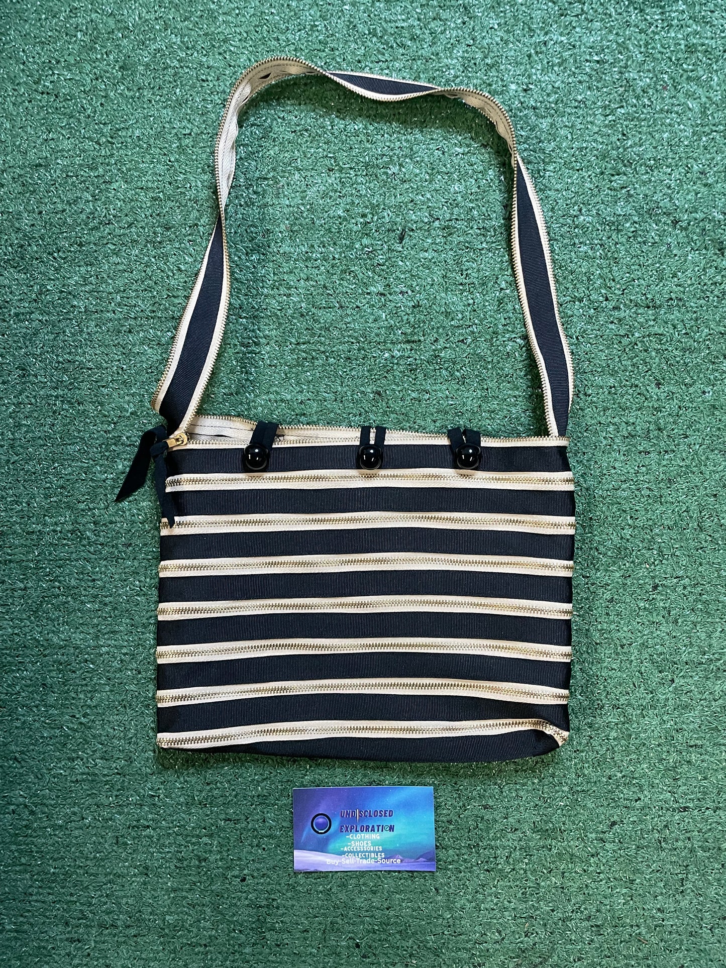 Black and cream all around zipper Purse