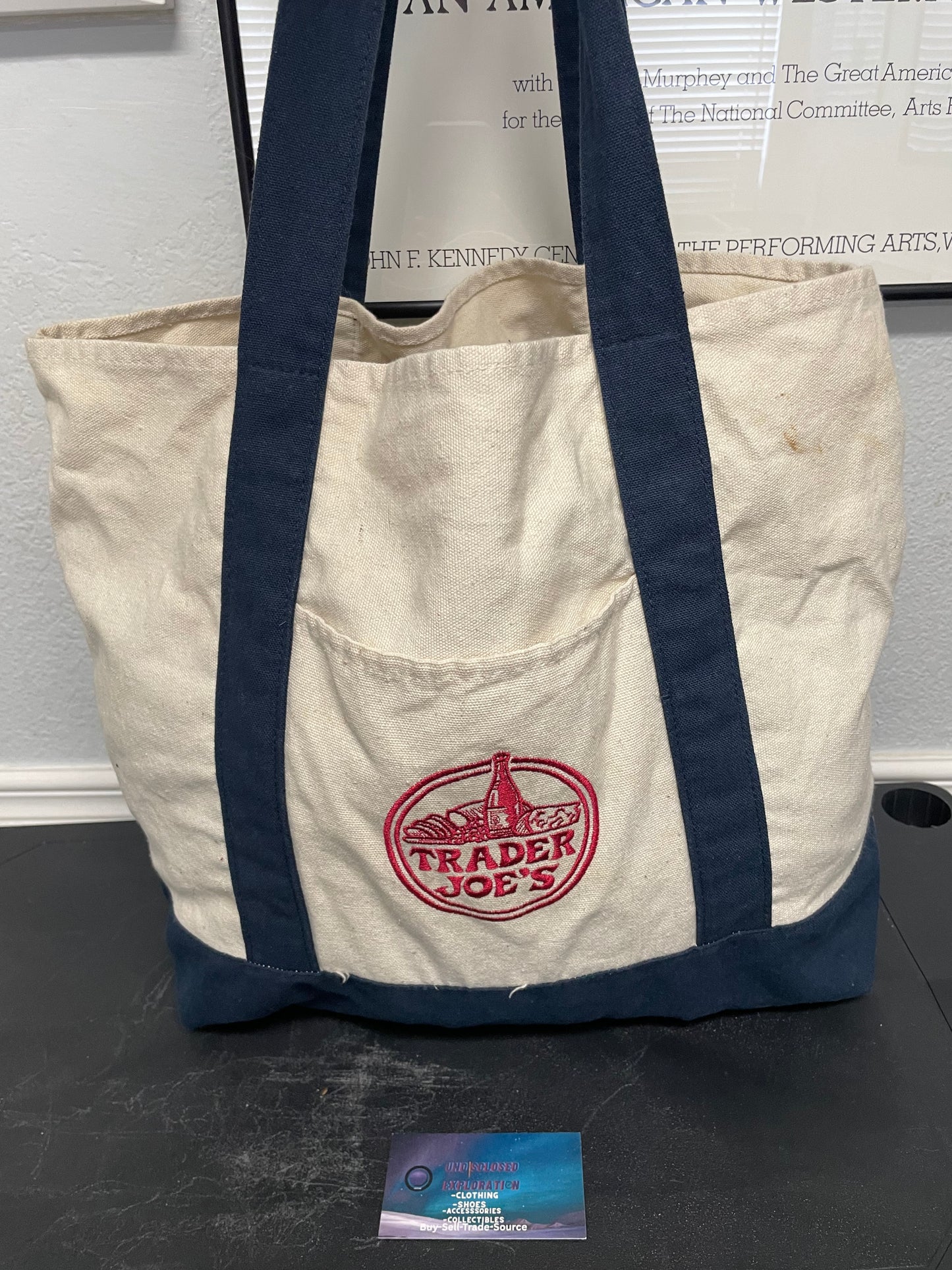 Trader Joe’s heavy duty cream and navy tote bag