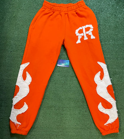 Orange embroidered sweatpants