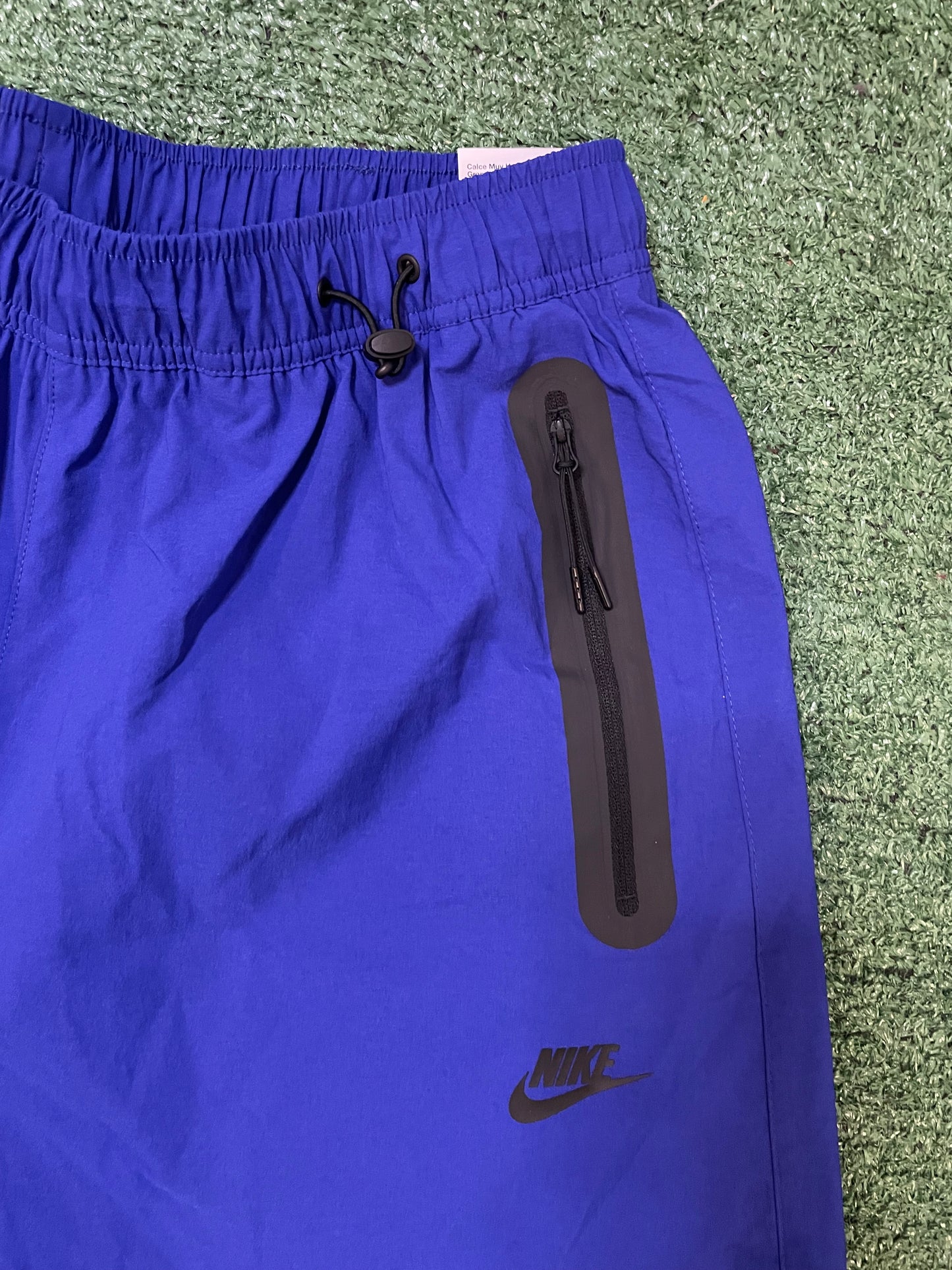 Nike tech woven blue pants
