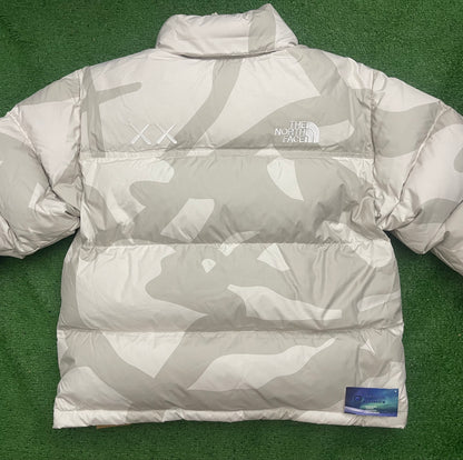 KAWS X The North Face Nuptse Moonlight Ivory