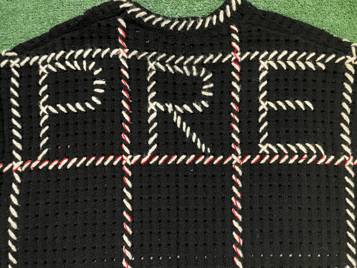 Supreme quilt stitch black sweater