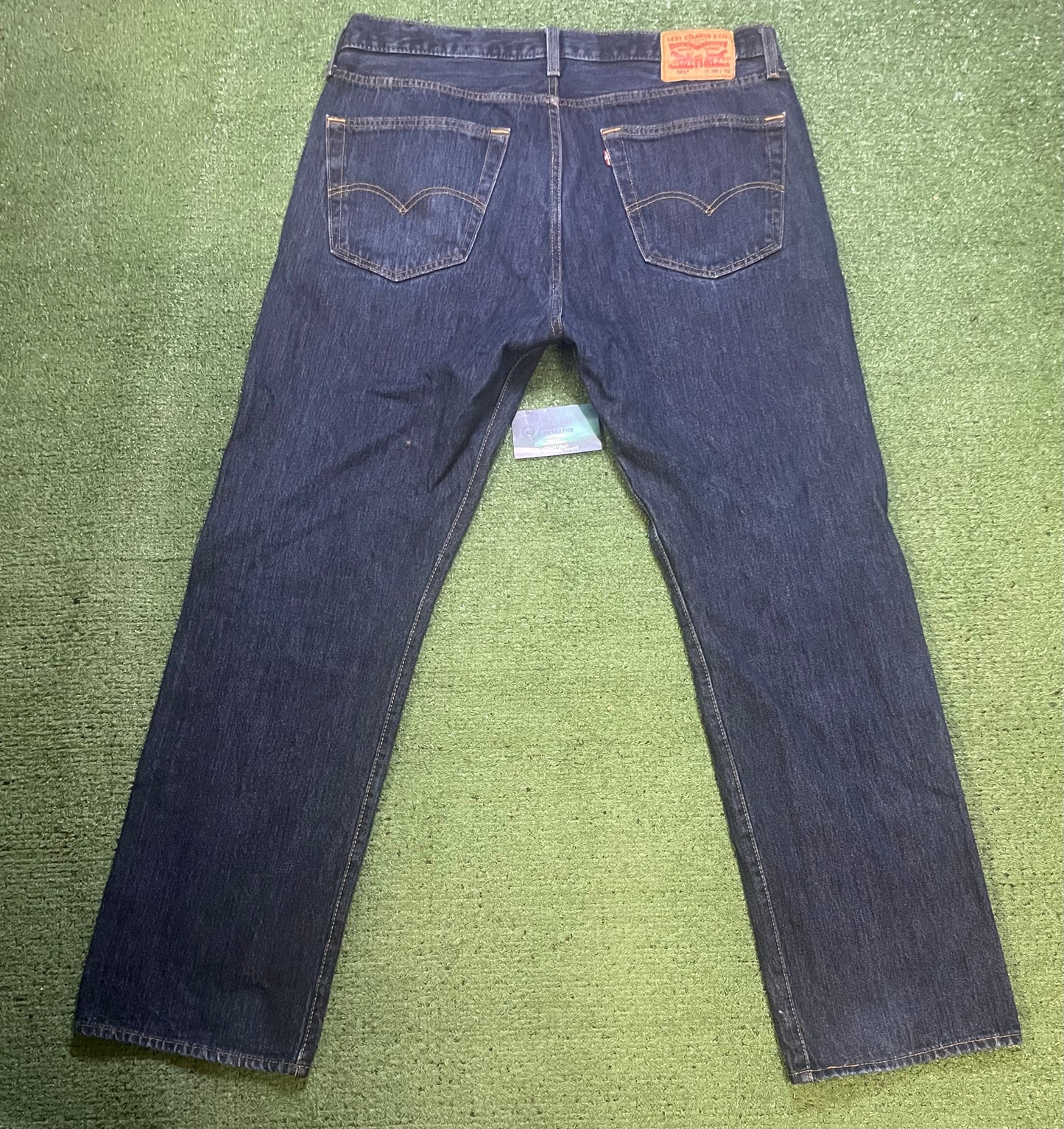 Levi’s 501 dark wash blue jeans