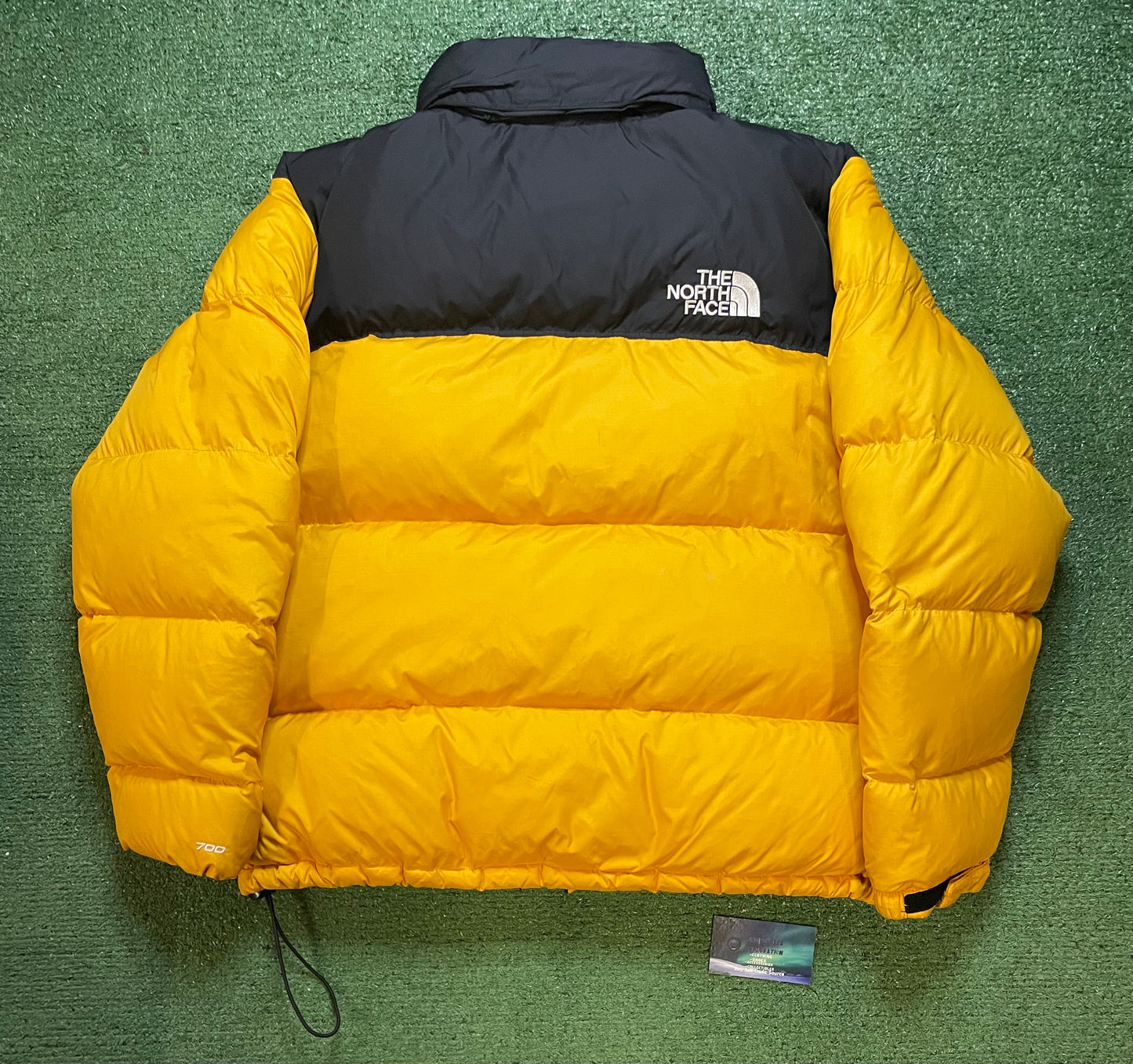 The North Face Nuptse 700 yellow jacket