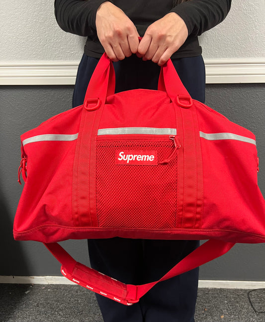 Supreme red duffle bag FW24