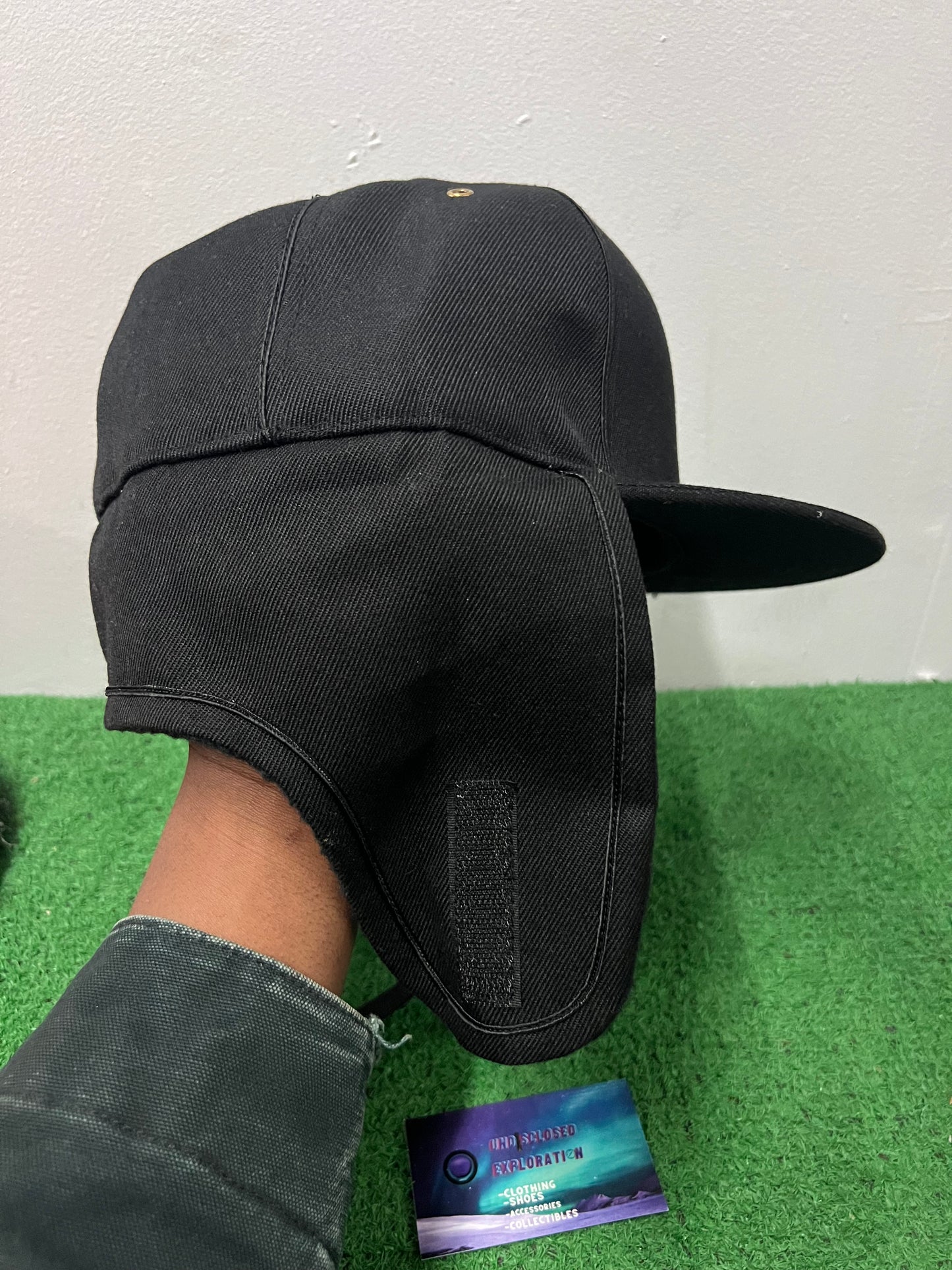 Black ear flap hat