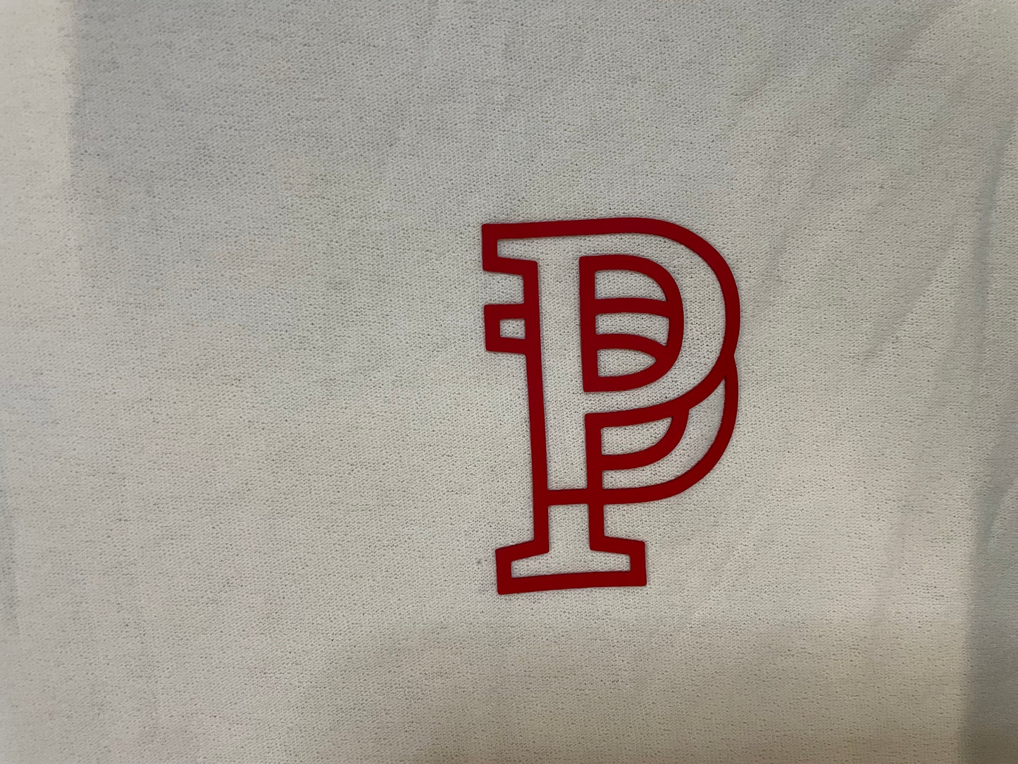 Purple brand embroidered logo cream tee