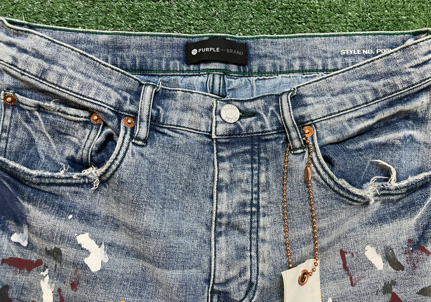Purple brand paint splatter jeans