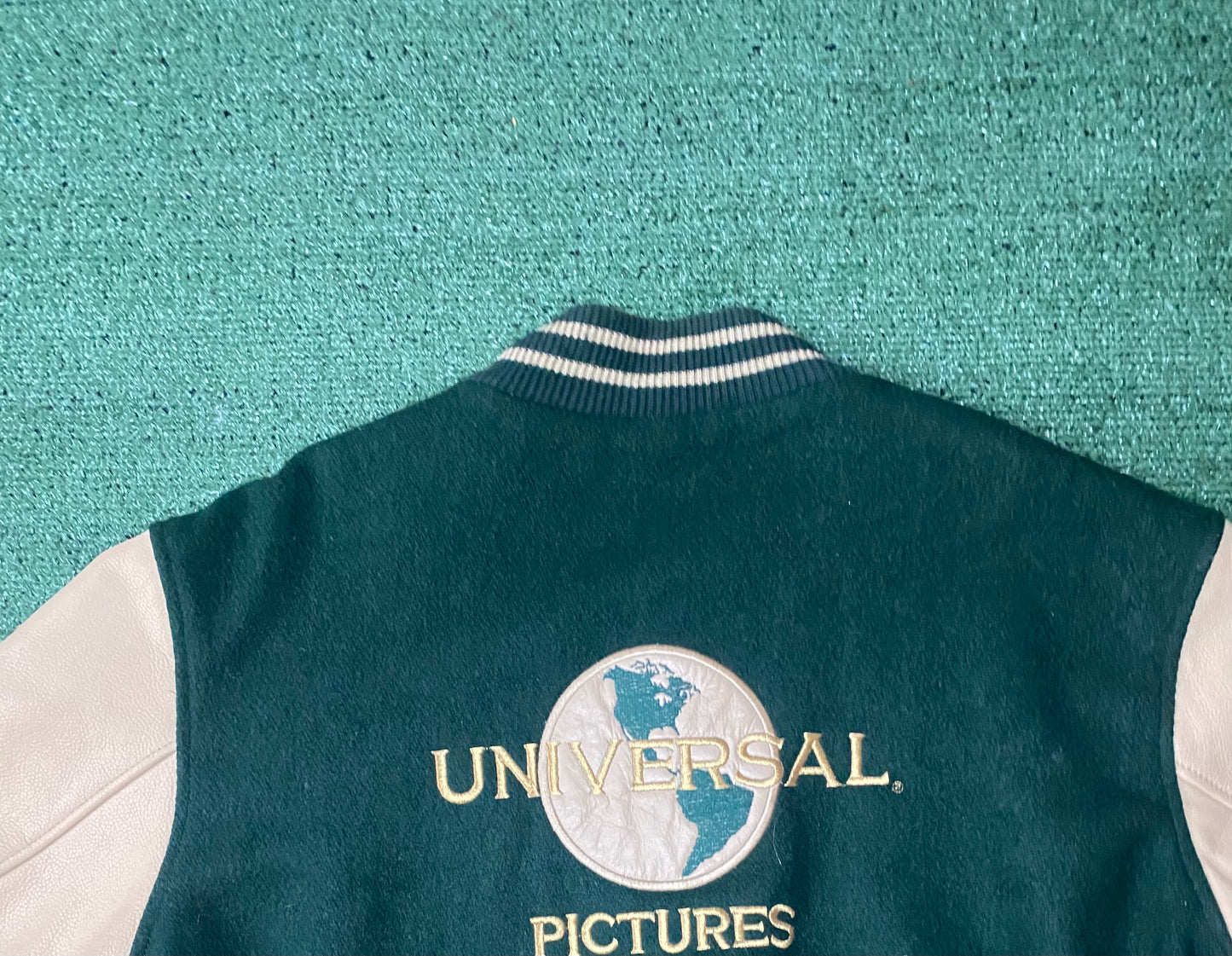 Vintage 1990s universal pictures wool and leather varsity jacket