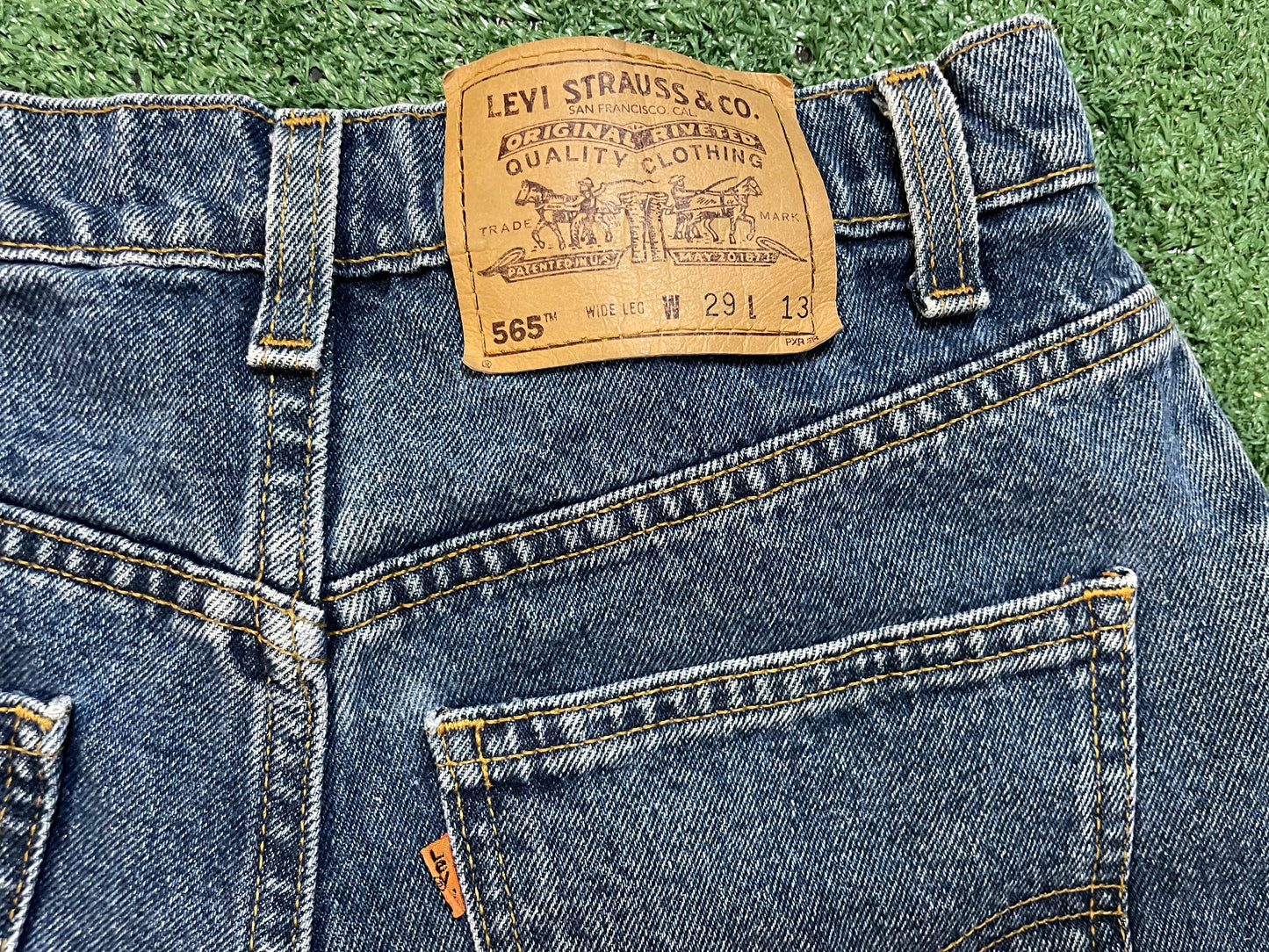 Vintage 1990s Levi 565 Orange tab Jean shorts