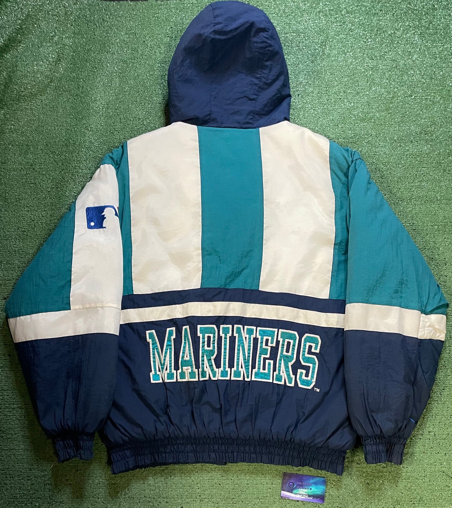 Vintage 1990s Seattle Mariners logo athletic puffer jacket