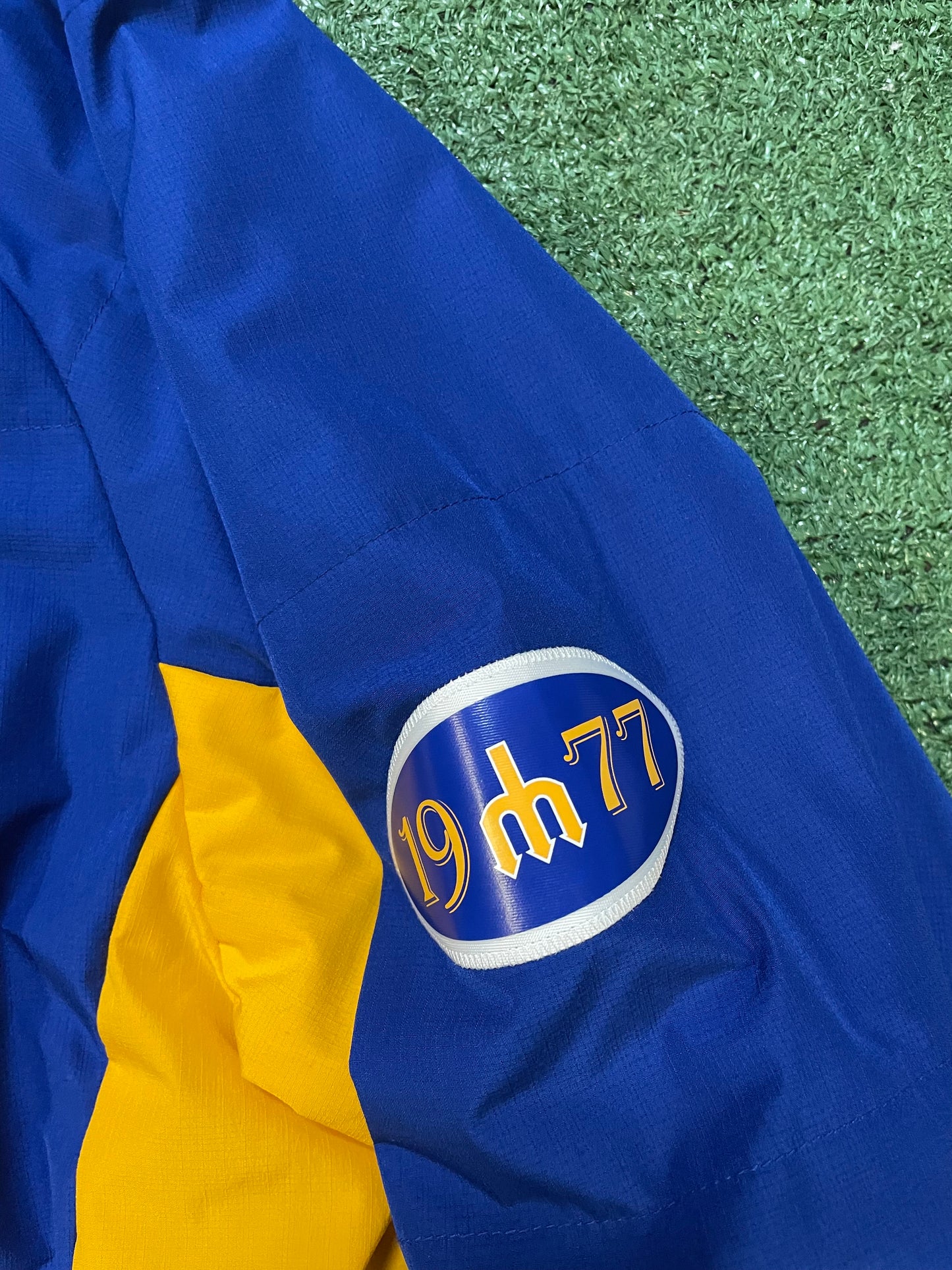 Seattle Mariners Cooperstown Collection blue and gold trident jacket