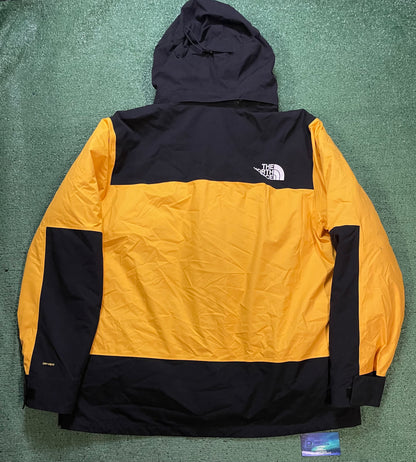 The North Face black & yellow mono mountain jacket