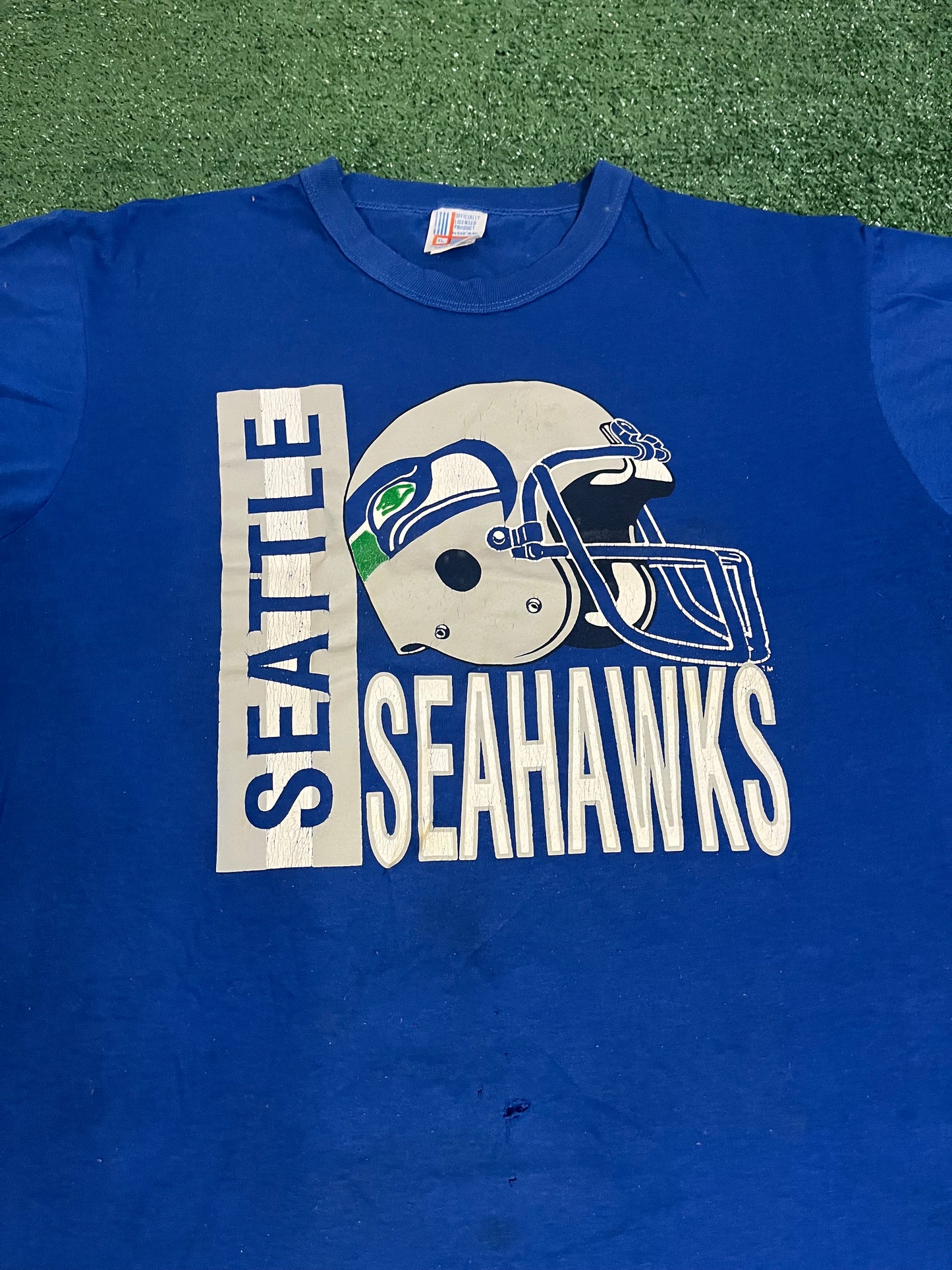 Vintage 1980s Seattle Seahawks helmet tee