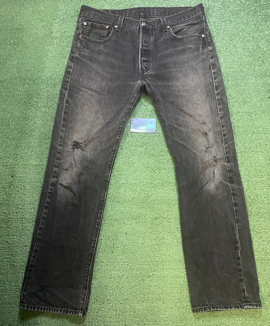 Vintage Levi’s 501 black distressed jeans