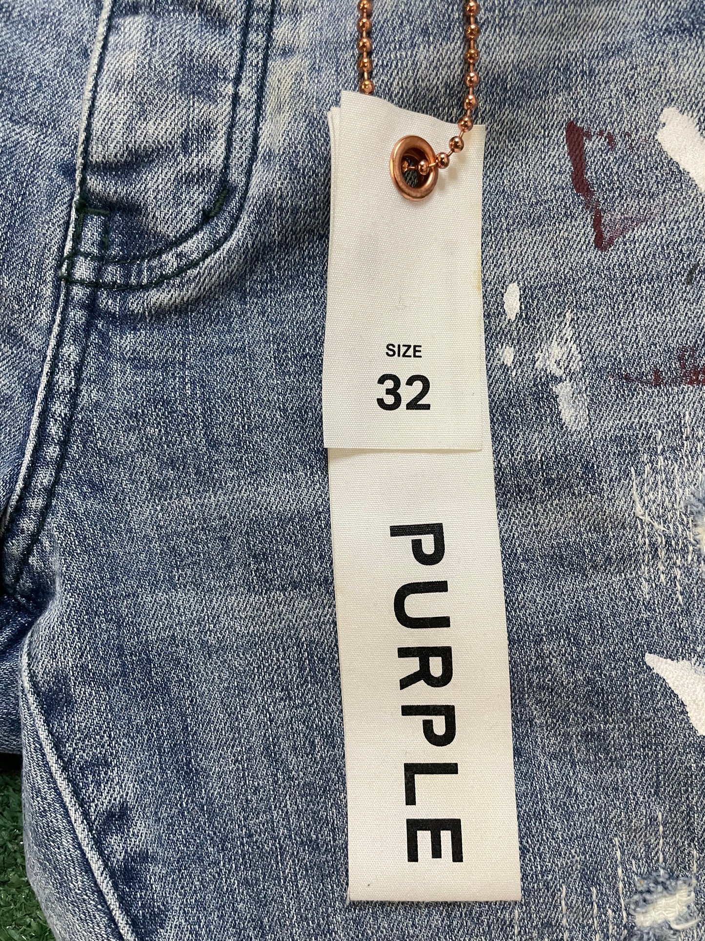 Purple brand paint splatter jeans