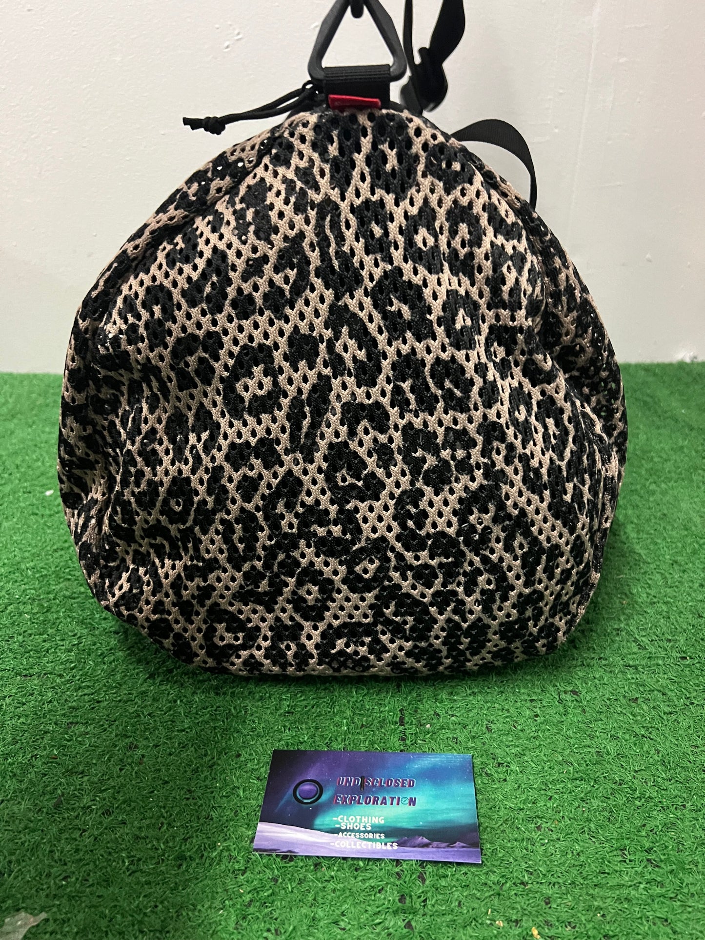 Supreme mesh leopard duffle bag
