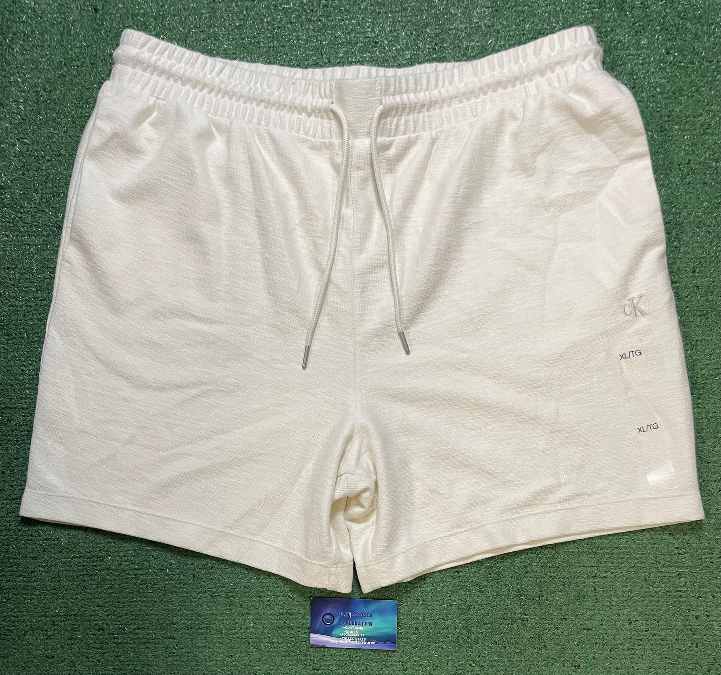 Calvin Klein cream embroidered shorts