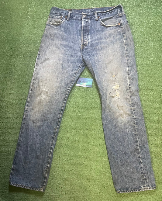 Levi’s 501 distressed jeans