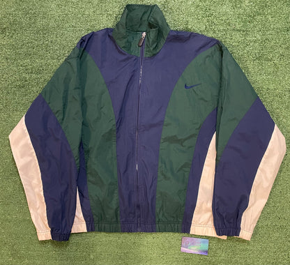 Vintage 1990s Nike blue green and white windbreaker jacket