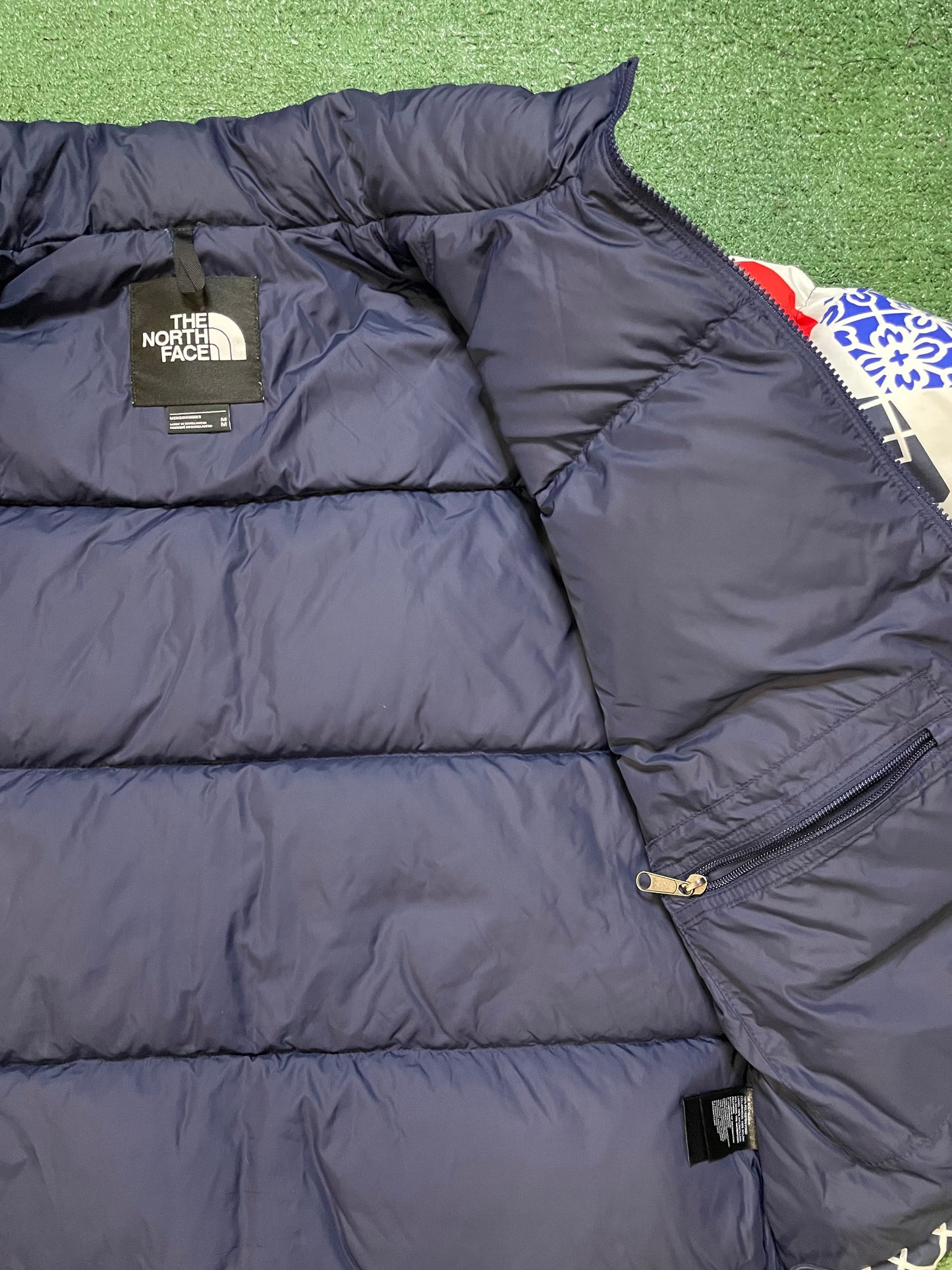 The North Face Nuptse 700 blue IC geo print jacket