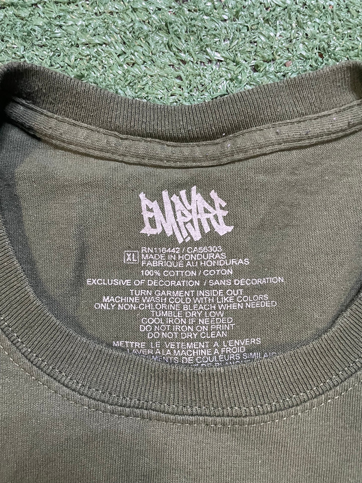 Empyre what goes around comes around green and yellow tee