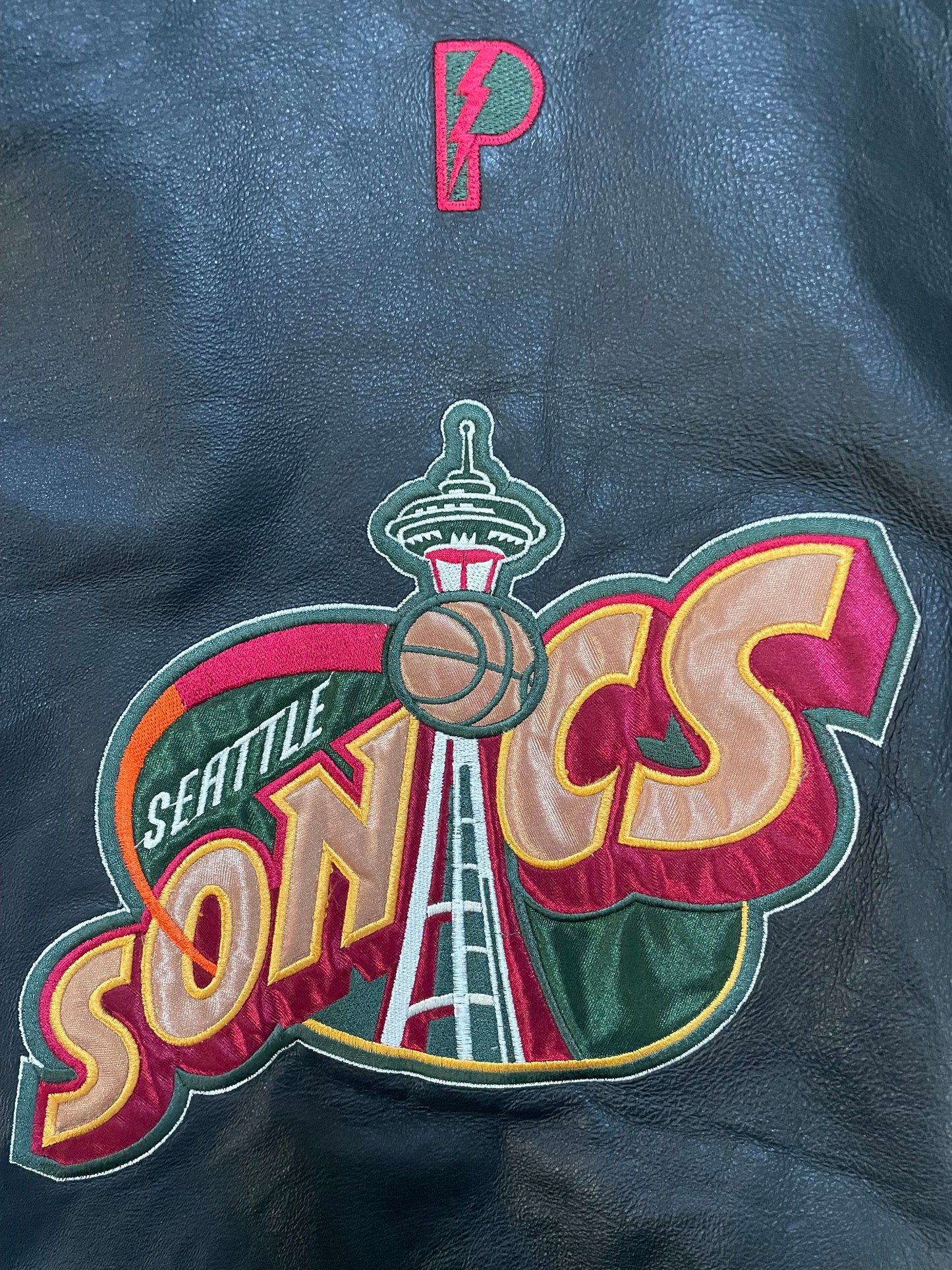Vintage 1990s Seattle Sonics pro player Sonics jacket