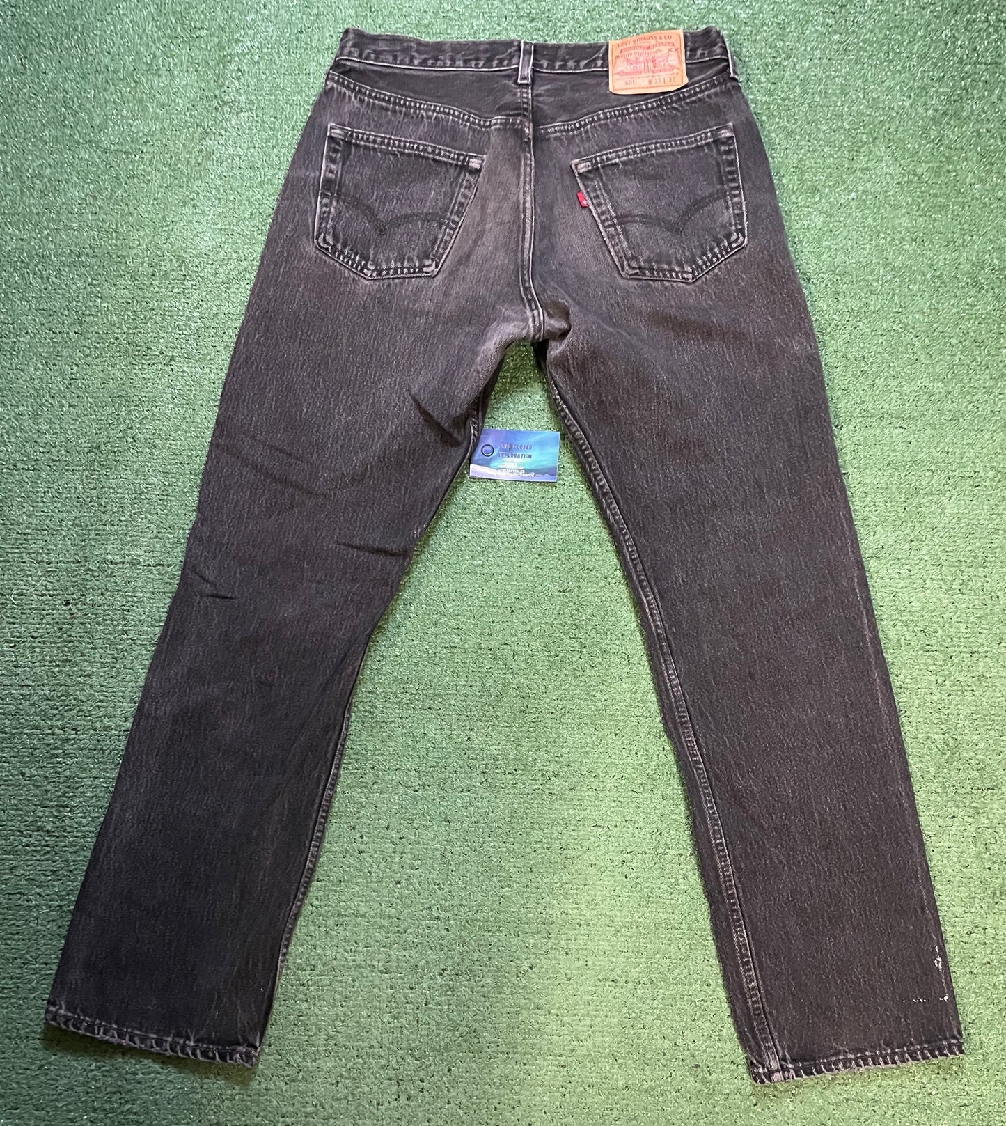 Vintage 1990s Levi’s 501 black faded jeans made in USA