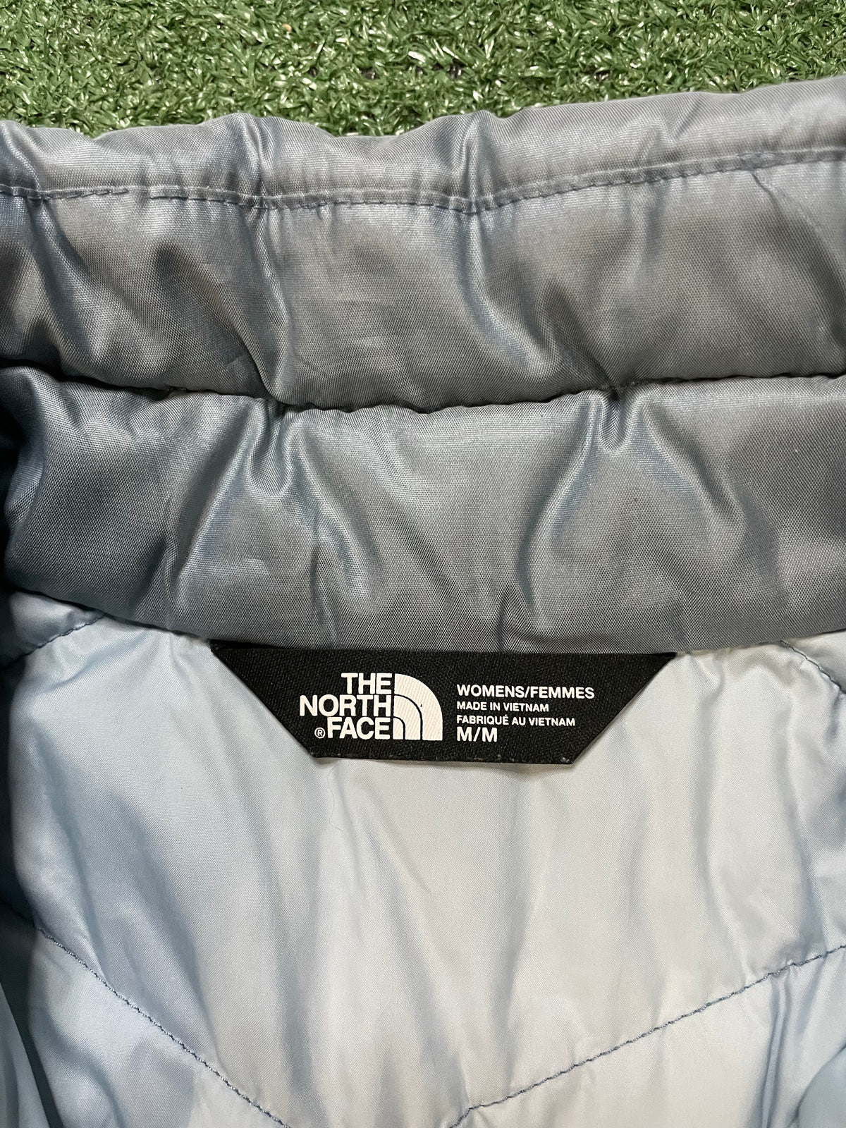 The North Face light blue 550 vest