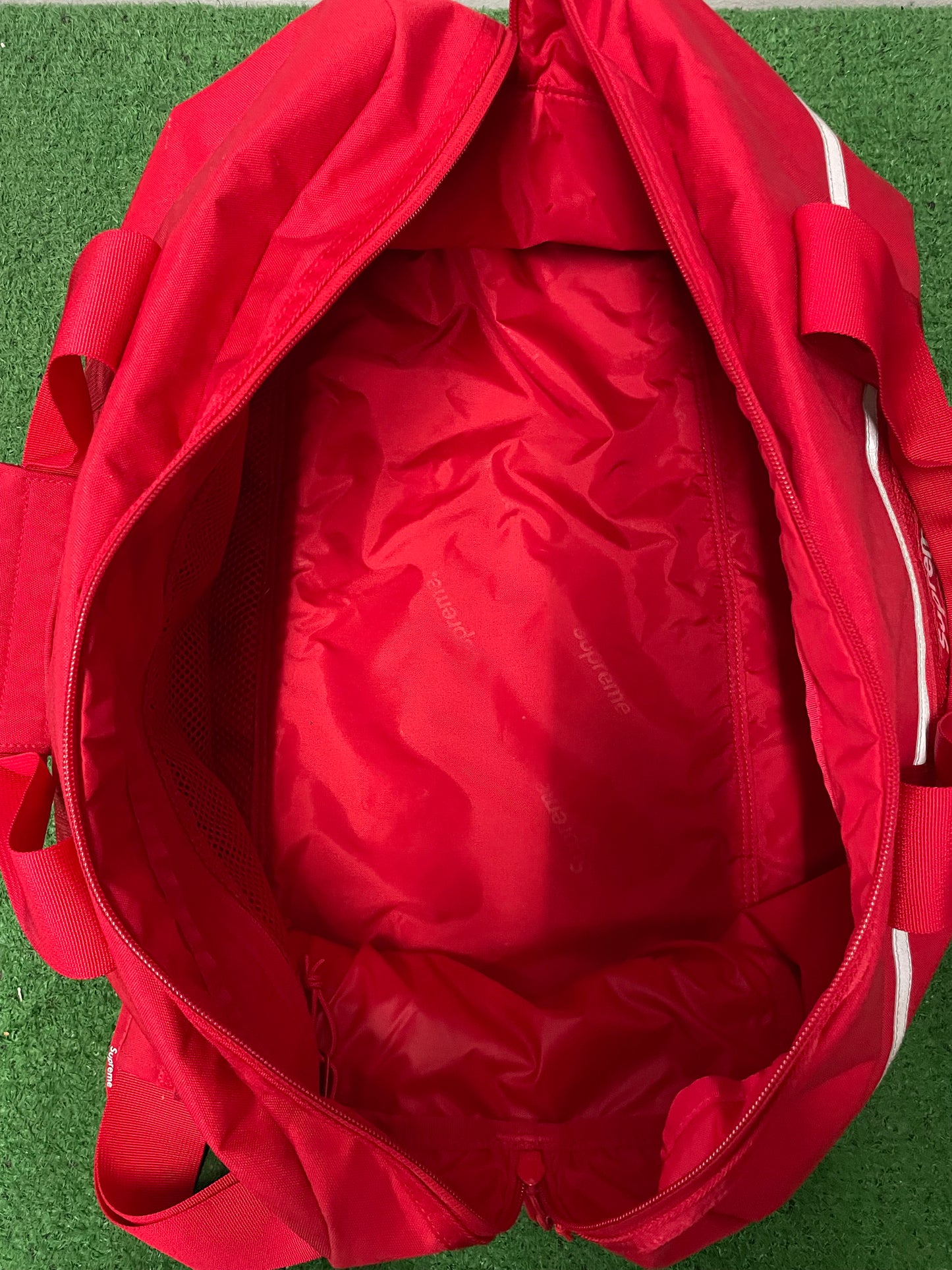 Supreme red duffle bag FW24