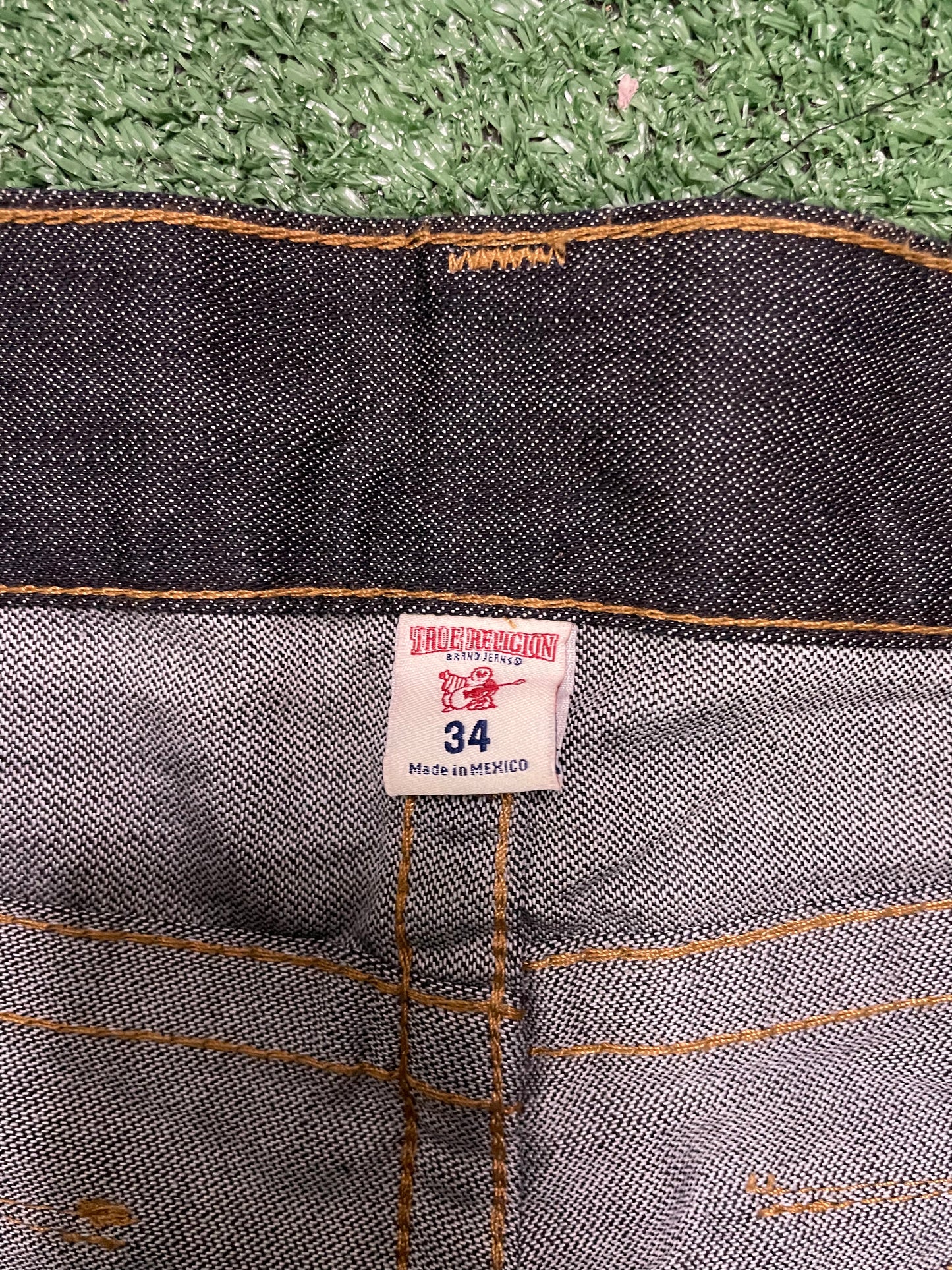 True Religion dark wash  gold stitch jeans