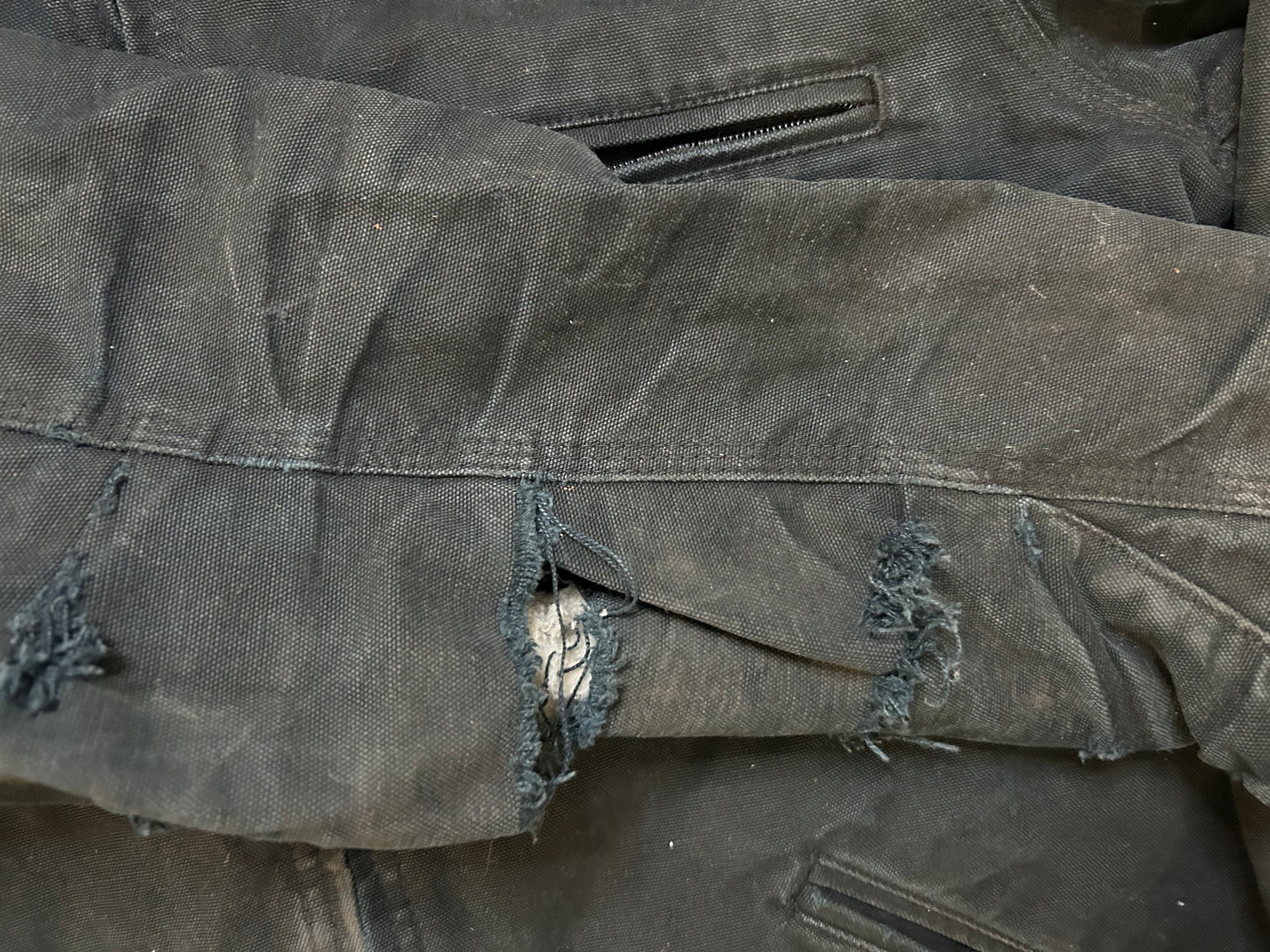 Carhartt distressed black Detroit jacket