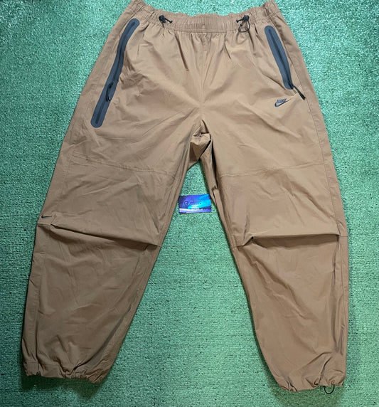 Nike tech woven khaki pants