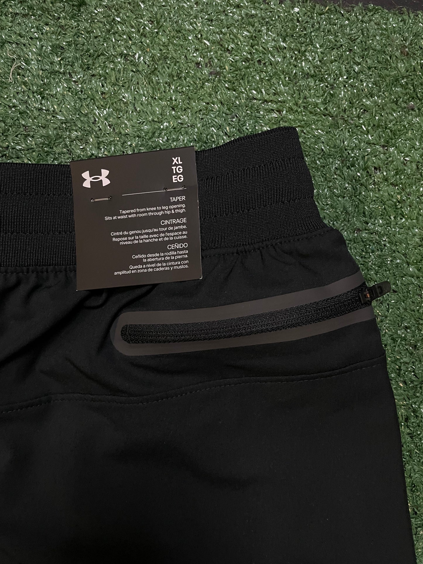 Under Armour woven sportswear taper pants